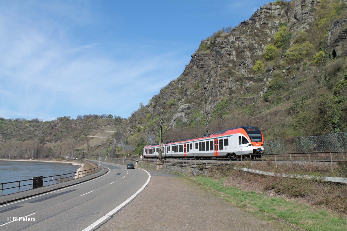 413 als SE25069 Koblenz - Frankfurt/Main kurz hinter der Loreley. 20.03.14