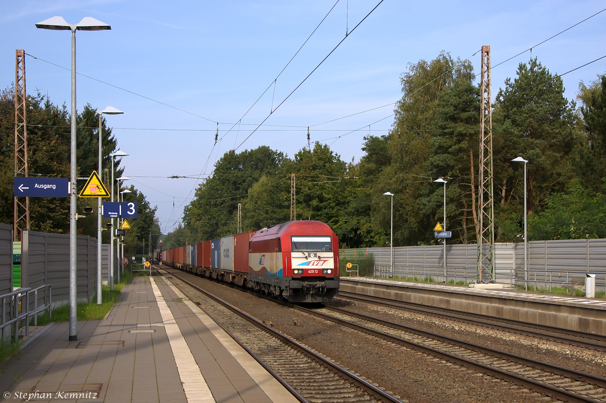 420 12 (223 032-4) EVB - Eisenbahnen und Verkehrsbetriebe Elbe-Weser GmbH mit einem Containerzug in Bienenbüttel und fuhr weiter in Richtung Uelzen. 29.09.2014