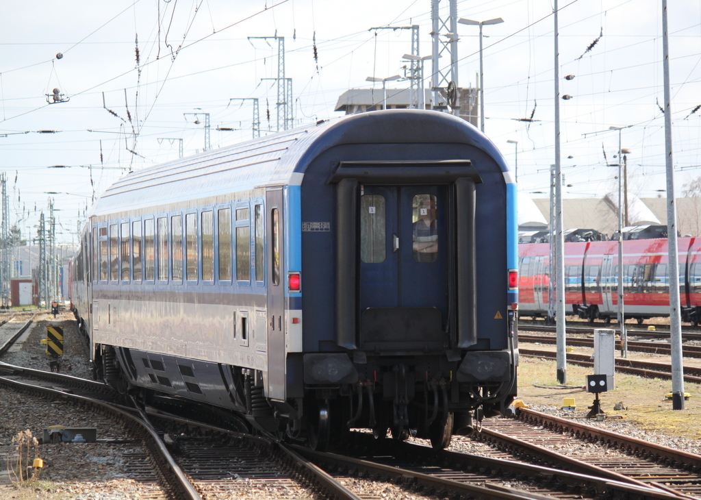 CD-Wagen Bmz lief am Ende des des EC 179(Warnemnde-Prag)mit hier bei der Ausfahrt am 03.04.2015 im Rostocker Hbf.