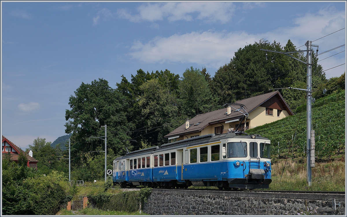 Der MOB ABDe 8/8  Fribourg  auf seiner Fahrt Richtung Montreux kurz vor Planchamp.
8. August 2018