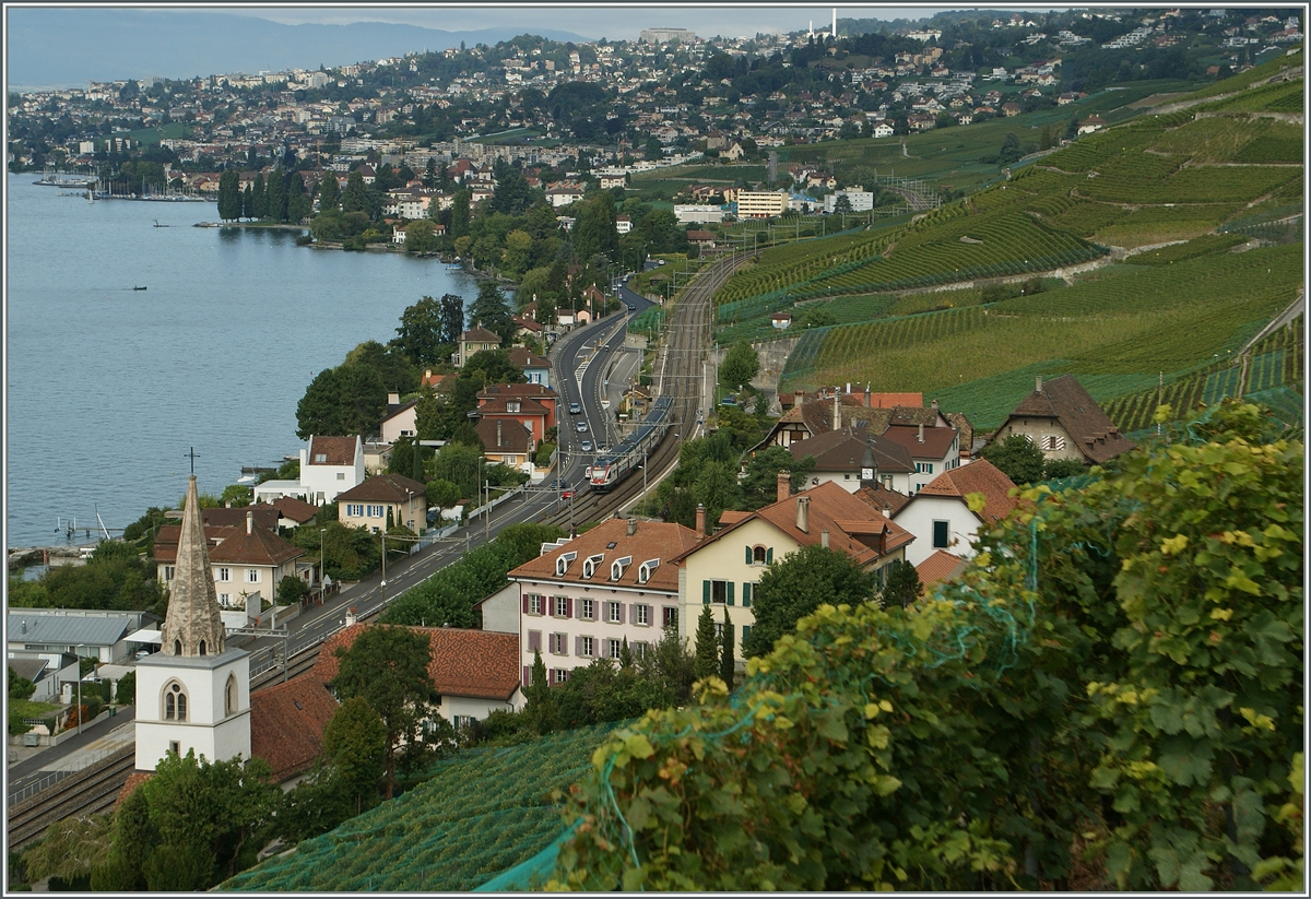 Der RABe 511 hat Villette schon hinter sich gelassen und strebt nun Lutry zu. 
20. Sept. 2013