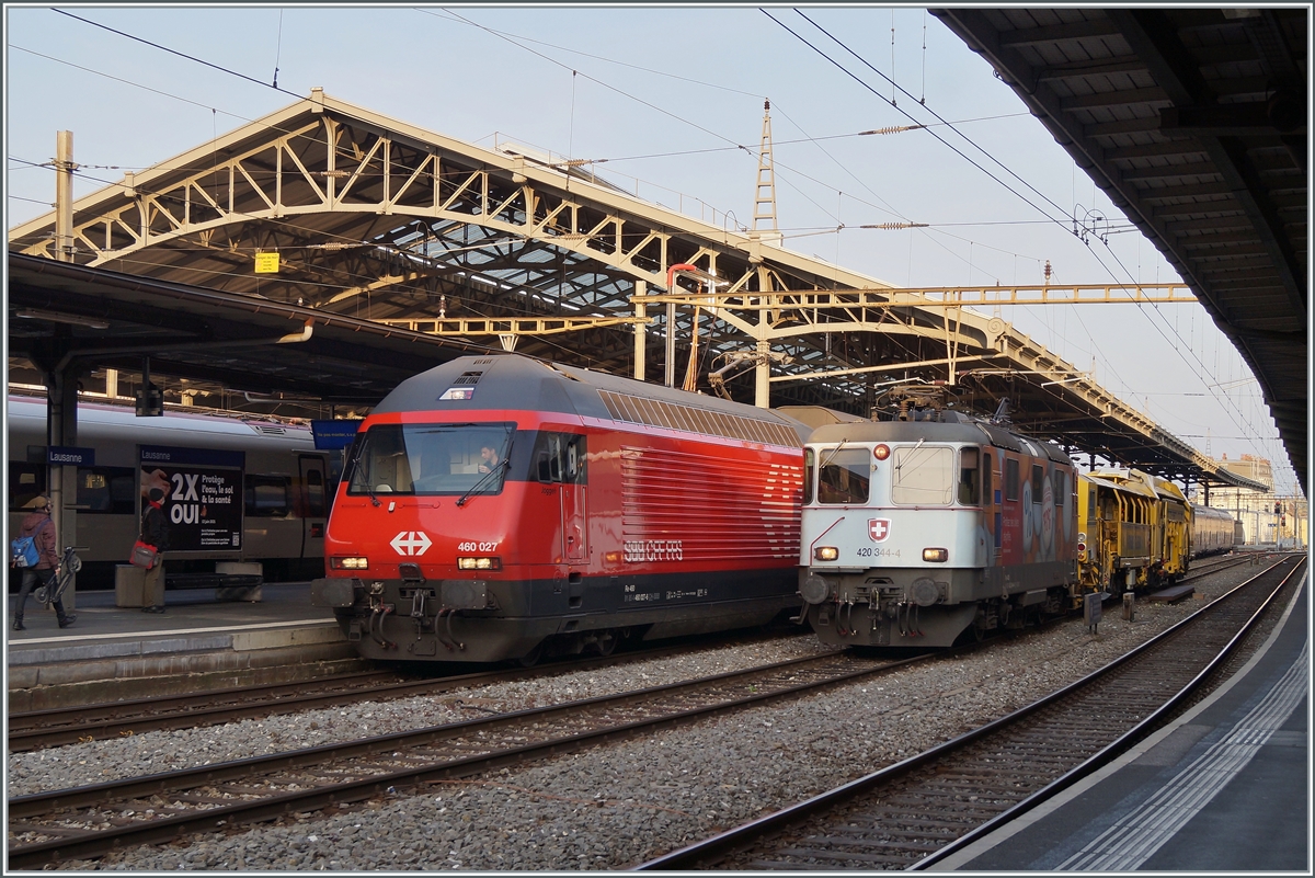 Die SBB Re 4/4 II 11344 (Re 420 344-4) und Re 460 027 in Lausanne.

17. April 2021