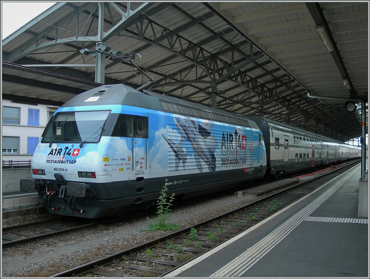 Die SBB Re 460 014-4 macht auf die Flugshow  Air14  in Payerne aufmerksam.
Lausanne, den 7. Juni 2014