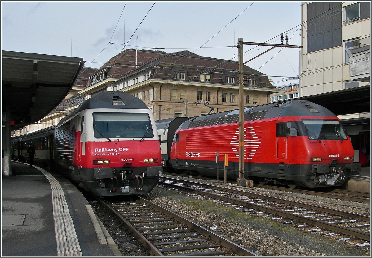 Die SBB Re 460 048-2 und 460 081-3 in Lausanne. Die IR auf Gleis 3 wird nach Brig fahren, der IC auf Gleis 1 nach St.Gallen
31. Jan. 2015