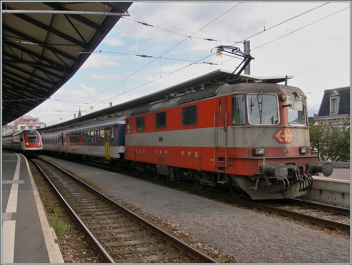 Die SBB Swiss-Express Re 4/4 II 11109 in Lausanne. 
16. Nov. 2006