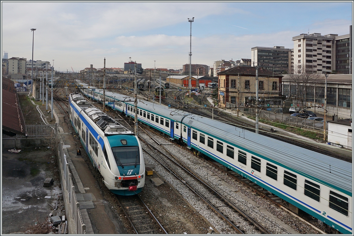 Ein Blick über das Gleisfeld von Torino Porta Nuova: Ein IC wird bereit gestellt und ein Minuettto erreicht in kürze sein Ziel.
09. März 2016