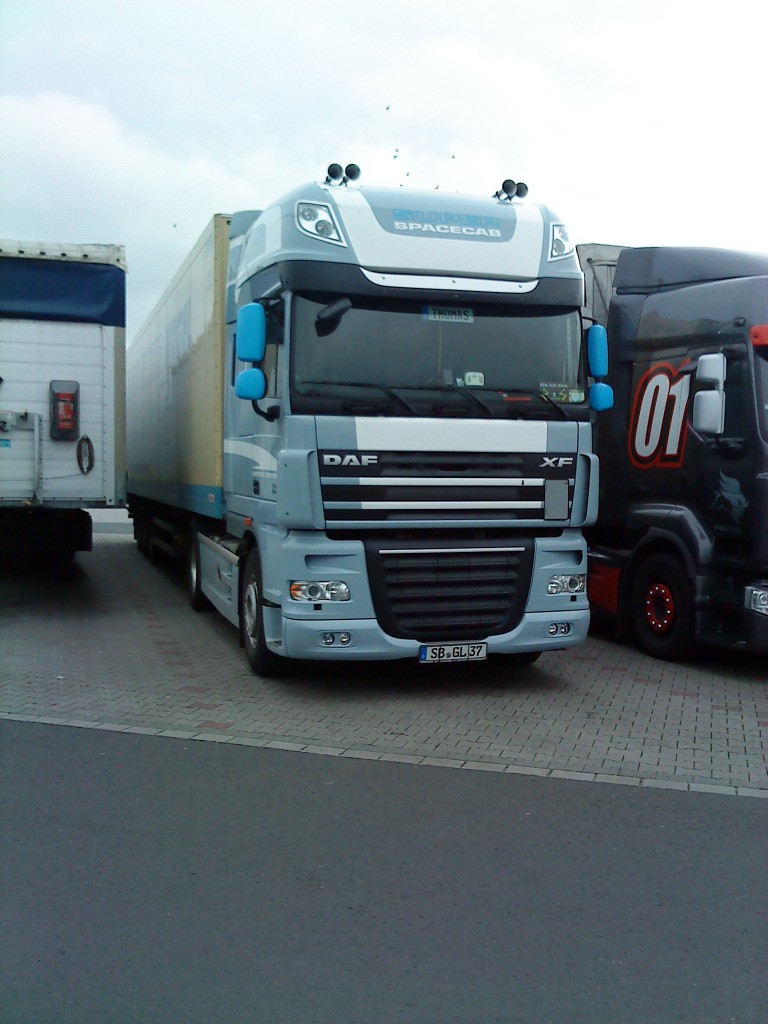 LKW SZM DAF XF Spacecab mit Khlkofferauflieger der Spedition Nagel-Group auf dem Autohof in Grnstadt am 06.11.2013
