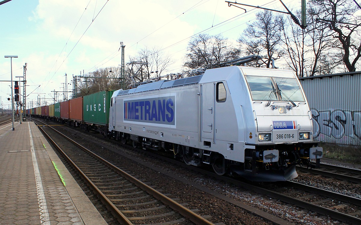 Metrans/HHLA 7 386 018-6(REV/07.02.15)mit Containerschlange aufgenommen in HH-Harburg am 01.04.2015