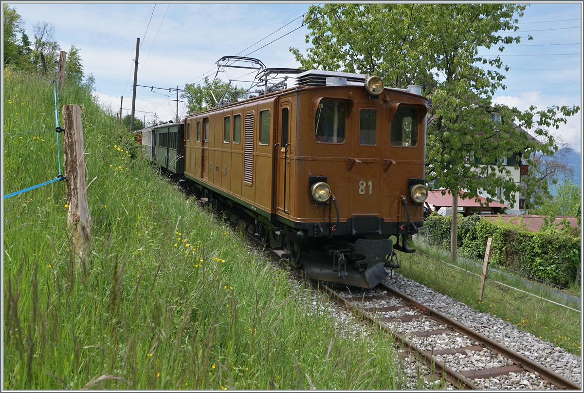 Nostalgie & Vapeur 2021 (Pfingstfestival) Die Blonay-Chamby Bahn Bernina Bahn Ge 4/4 81 ist bei Cornaux mit einem Personenzug nach Blonay unterwegs. 

22. Mai 2021