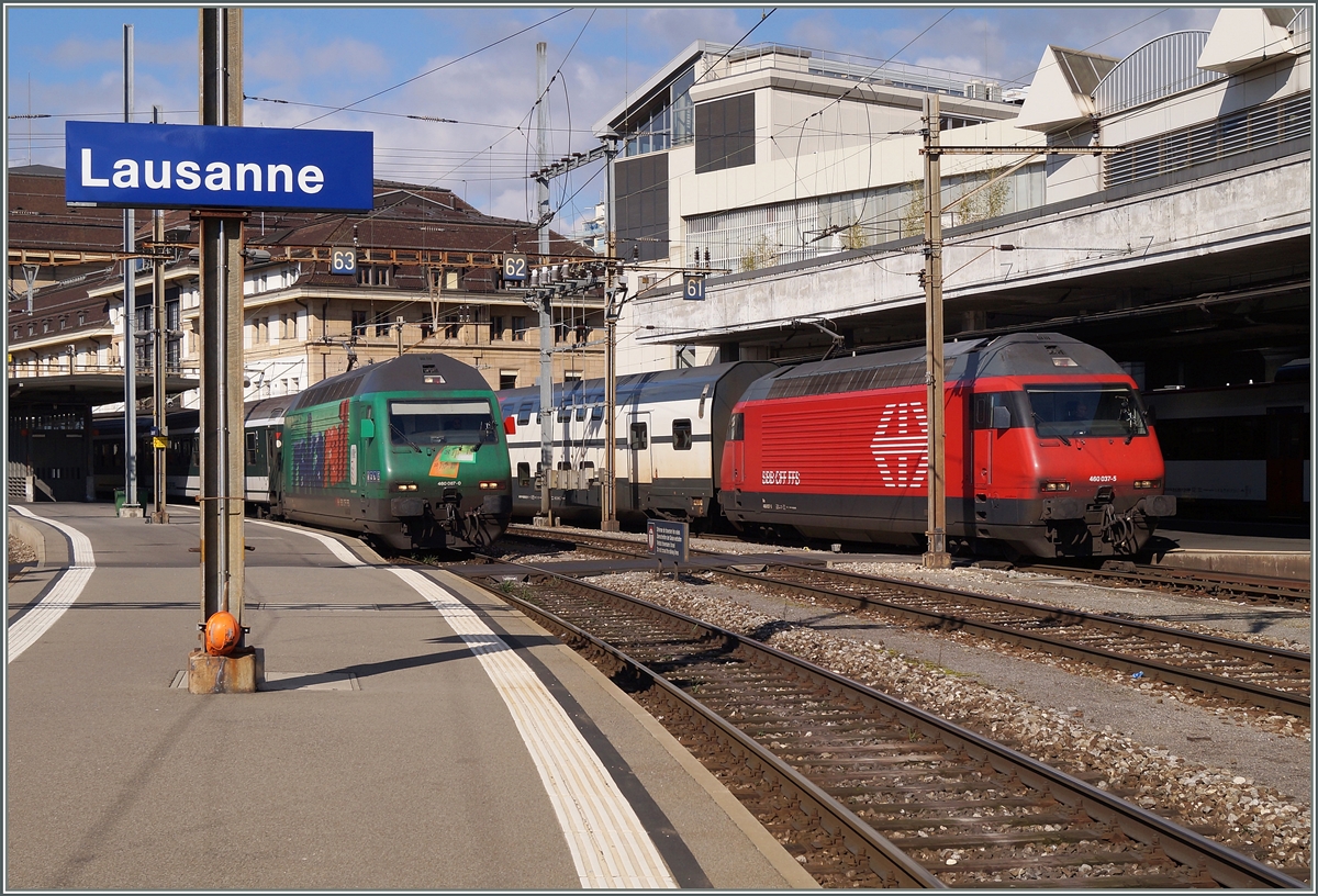 SBB Re 460 087-0 mit IR nach Brig und Re 460 037-5 mit IC nach St- Gallen in Lausanne.
2. März 2014