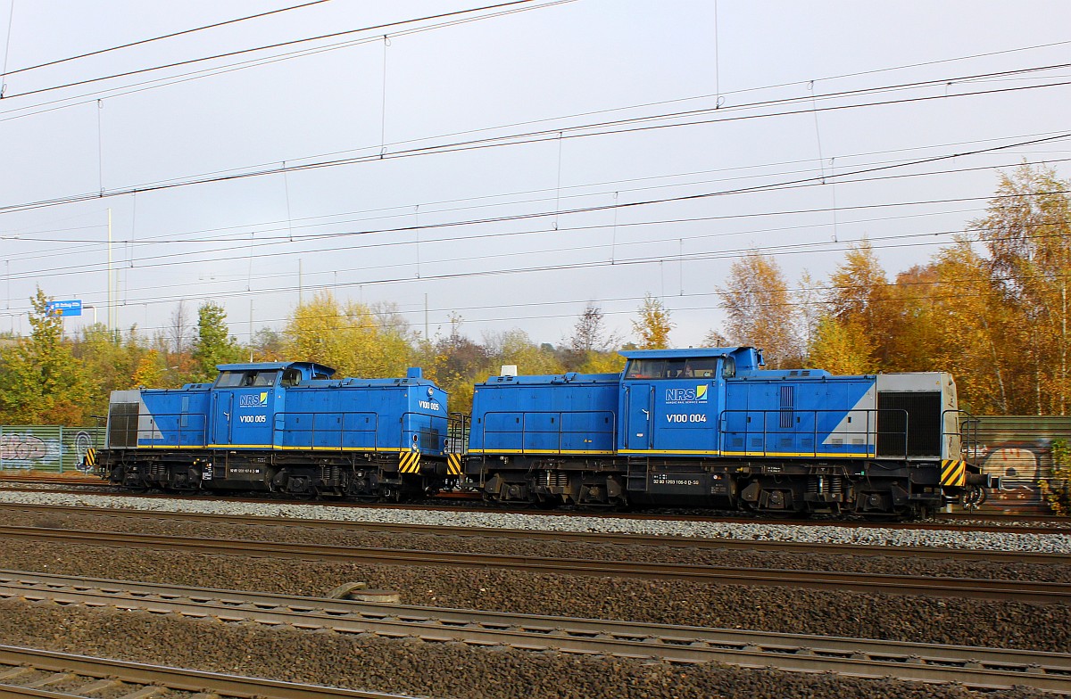 Schickes Diesel-Doppel der NRS(NordicRailService Lübeck) V100 004(1203 106-0) und V100 005(1203 107-8) dieseln hier durch Hamburg-Harburg. 04.11.2015