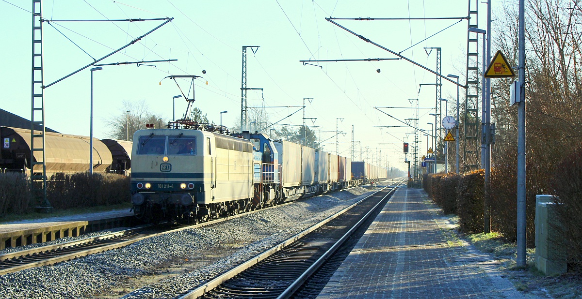 SEL 181 211 mit neg 575 003 und dem Nordliner nach Pattburg/DK. Jübek 06.01.2022