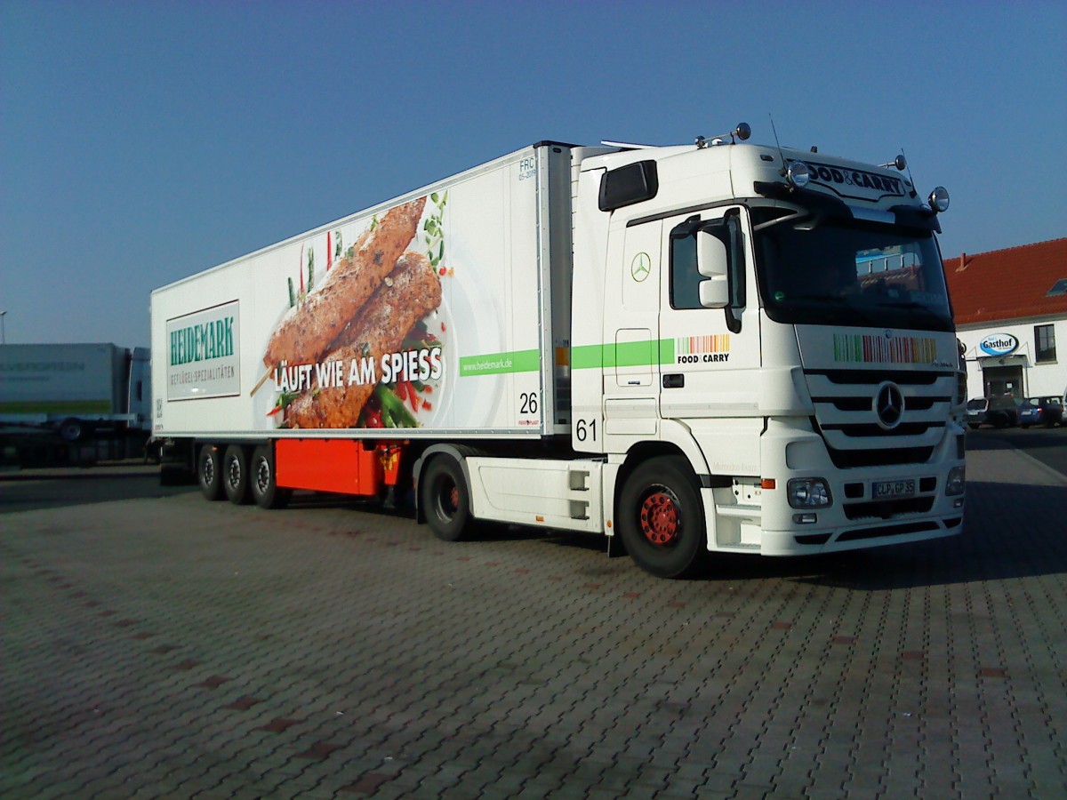 SZM Mercedes-Benz Actros mit Tiefkhlkoffer-Auflieger der Firma Heidemark gesehen auf dem Autohof in Grnstadt am 12.03.2014