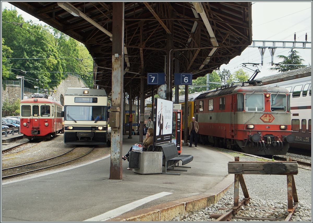 Von links nach Rechts: CEV BDe 2/4 74, CEV GTW Be 2/6 7001  Vevey  und SBB Swiss Express Re 4/4 II 11109 in Vevey am 28. Mai 2014