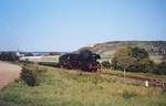 Die 03 1010-2 vom DB Museum mit einem leeren Winzerfestsonderzug von Freyburg in die Abstellung nach Naumburg Hbf, am 12.09.1999 bei Ni�mitz. (Foto: Bodo Zorn)