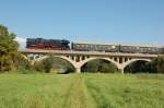 LEG 65 1049-9 mit dem leeren Sonderzug aus Chemnitz auf der Fahrt zur Abstellung nach Karsdorf, am 11.09.2010 auf dem Unstruthochwasserviadukt bei Kirchscheidungen. (Foto: dampflok015)