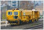 Plasser & Theurer Universalstopfmaschine 08 - 475 Unimat 4S der Infrabel (ein Tochterunternehmen der SNCB/NMBS) abgestellt am 23.11.2013 beim Lige Guillemins (Lttich).