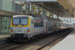 NMBS 1860 schiebt ein IC nach Oostende aus Gent Sint-Pieters am 5 Mai 2023.