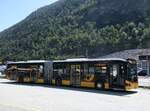 (265'724) - CarPostal Ouest - VD 561'865/PID 11'964 - MAN am 16. August 2024 beim Bahnhof Gampel-Steg