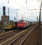 185 337-0 mit dem Ewals/Rhenus KLV aufgenommen aus dem SH Express in Neumünster. 08.07.2011