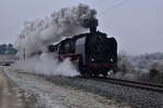 In Thüngen  ist 50 380 am Morgen mit einem  SDZ auf der Werntalbahn gen Waigolshausen  fahrend  zu sehen. 28.12.24