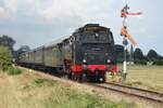 VSM 64 415 zieht ein Dampfpendelzug durch Lieren am 4 September 2022.