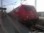 101 089-1 mit CEWE-Fotobuchwerbung von REWE am EuroCity 378 mit ziel Ostseebad Binz im Bahnhof Bergen auf Rgen am 8.5.13