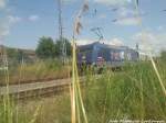 101 025-5 mit dem InterCity (IC) und am anderen ende des Zuges 101 108 aus Ostseebad Binz bei der Einfahrt in Rostock Hbf am 22.6.13