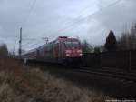 Die Eintracht Frankfurter 101 110-5 mit einem InterCity zwischen Stralsund Hbf und Stralsund-Grünhufe am 16.3.14