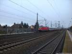 101 115 mit einem InterCity mit ziel Kln Hbf beim vorbeifahren am S-Bahnhof Halle Messe am 13.12.14