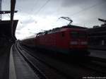 112 111 als RE5 mit ziel Lutherstadt Wittenberge im Bahnhof Rostock Hbf am 27.9.13