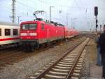 112 112 als RE5 mit ziel Holzdorf (Elster) bei der Ausfahrt aus Stralsund Hbf am 12.10.13