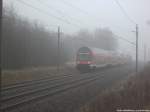 Mit steuerwagebn voraus kam 112 104 als RE3 aus Elsterwerda in Richtung Stralsund Hbf am 6.3.14