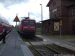 112 185 als RE5 mit Ziel Stralsund Hbf im Bahnhof Sternfeld am 16.6.14