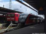 112 101 und 642 551/ 051 als RB12 mit ziel Graal-Mritz im Bahnhof Rostock Hbf am 15.7.14