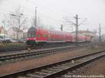 Mit Steuerwagen voraus verlsst 112 170 verlsst den Bahnhof Delitzsch unt Bf in Richtung Leipzig Hbf am 29.2.16