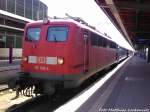 115 198-4 ist gerade mit dem EuroCity im Bahnhof Stralsund Hbf angekommen und wird vom Zug Abgekuppelt am 18.6.13