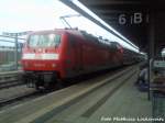 120 207-6 steht als RE1 mit Ziel Hamburg Hbf im Bahnhof Rostock Hbf am 11.9.12