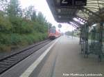 Einfahrt BR 143 mit Dostos (S-Bahn Rostock) als S1 mit Ziel Rostock Hbf in den Bahnhof Rostock - Parkstrae am 11.9.12