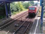 143 889-4 als S1 mit ziel Warnemnde bei der Einfahrt in den S-Bahn Hp.