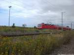 143 899-4 mit dem RE9 mit ziel Stralsund Hbf bei der Einfahrt in Altefhr am 7.8.13