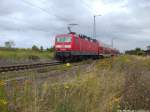 143 899-4 mit dem RE9 mit ziel Ostseebad Binz bei der Ausdfahrt aus Altefhr am 7.8.13