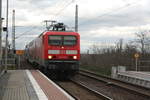 143 919 von Eilenburg kommend bei der Einfahrt in den Bahnhof Delitzsch ob Bf am 21.1.21