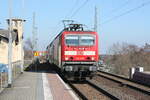 143 957 von Eilenburg kommend mit Ziel Halle/Saale Hbf bei der Einfahrt in den Bahnhof Delitzsch ob Bf am 10.3.22