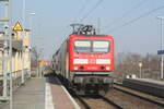 143 932 von Eilenburg kommend bei der Einfahrt in den Bahnhof Delitzsch ob Bf am 24.3.22