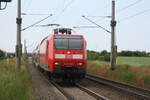 146 024 mit dem RE30 mit ziel Magdeburg Hbf bei der Einfahrt in Zberitz am 9.6.21