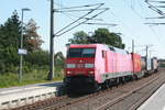 152 018 mit einem Gterzug bei der durchfahrt in Zberitz am 14.7.20