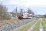 TXL 193 878   Wir brennen für was wir tun  mit einem Autozug am Haken gen Karlstadt fahrend In Thüngersheim. 17.2.2024 
 