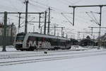 1648 911/411 mit dem RE4 von Goslar kommend bei der Einfahrt in den Endbahnhof Halle/Saale Hbf am 15.2.21