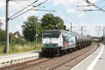 145 023 (145 083) der PRESS mit einem Kesselzug bei der durchfahrt in Zberitz am 14.7.20